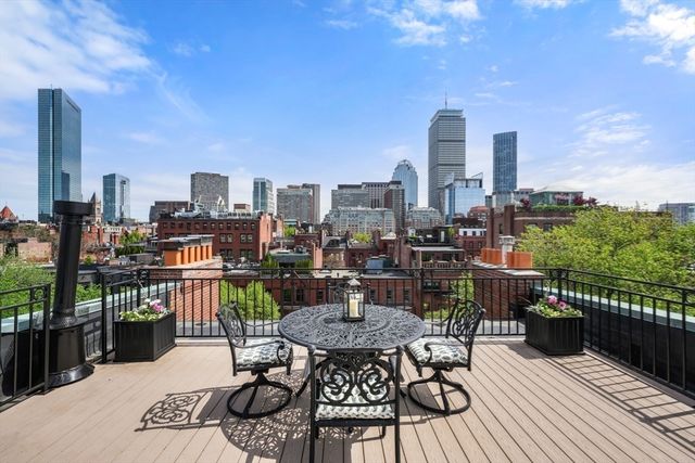 a view of a terrace with sitting area