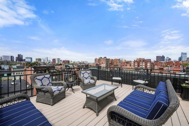 a view of a bathroom with swimming pool and wooden floor