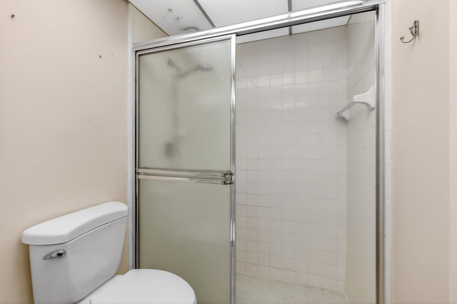 3951 Northeast 19th Road, Unit 1701 Pompano Beach, FL 33064 - Photo 58 of 82 a white toilet sitting next to a shower