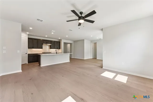 a view of a kitchen with a sink and dishwasher