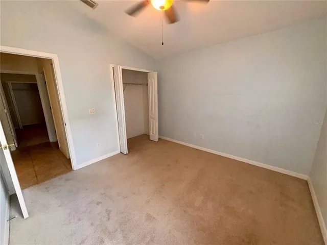 a view of a golf course with a lake