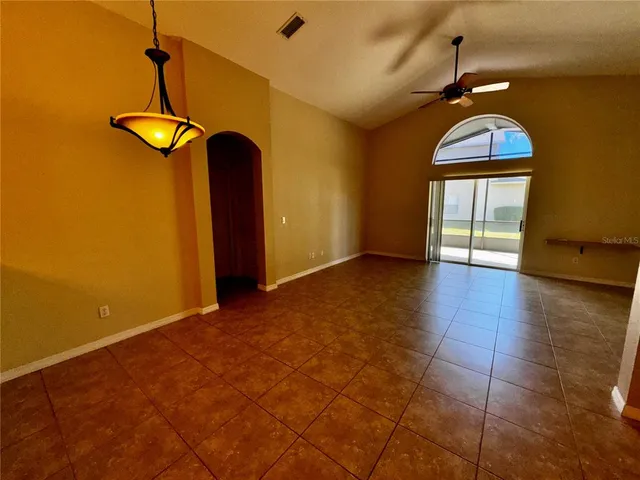 a view of a livingroom with furniture and wooden floor