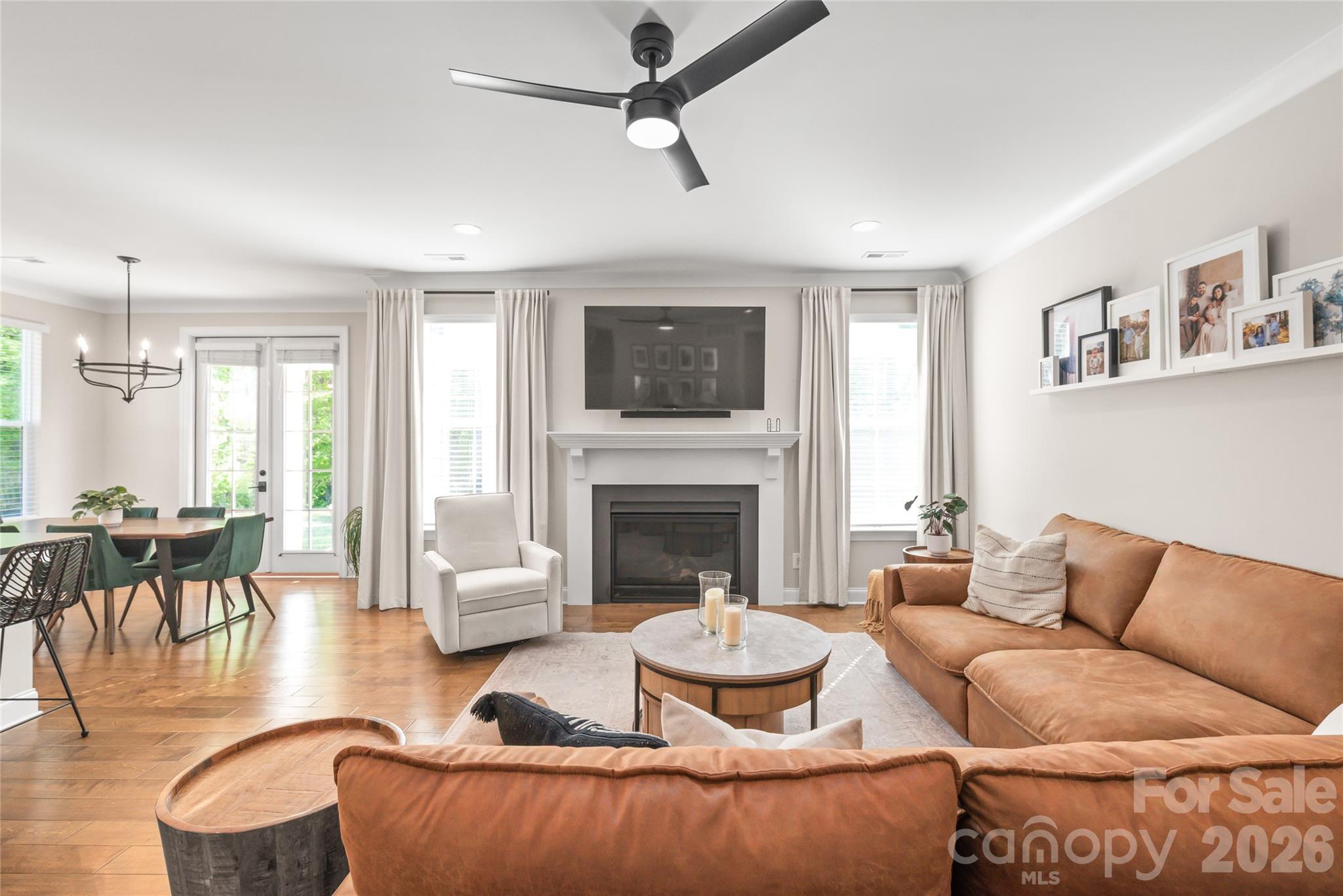 3213 Timber Run Lane Maiden, NC 28650 - Photo 23 of 47 a living room with furniture and a fireplace