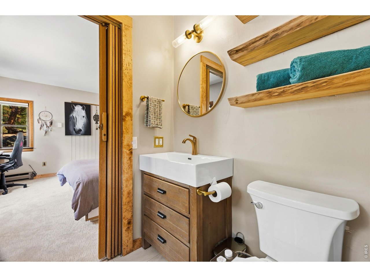 128 Elk Road Lyons, CO 80540 - Photo 21 of 50 Newly updated bathroom with live edge wood shelves