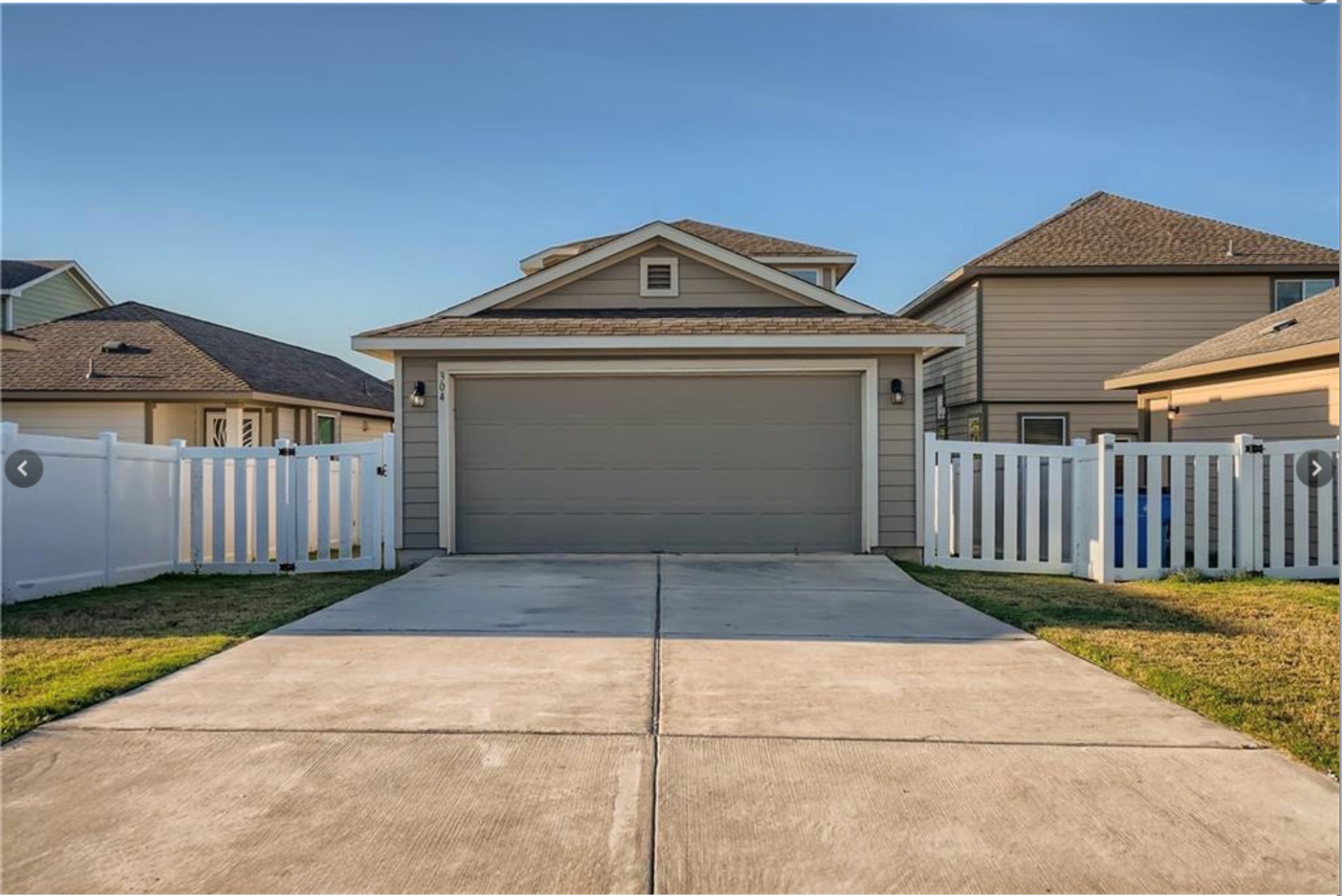 304 Cane River Road Pflugerville, TX 78660 - Photo 29 of 31 A well-maintained concrete driveway leads to a welcoming single-car garage.