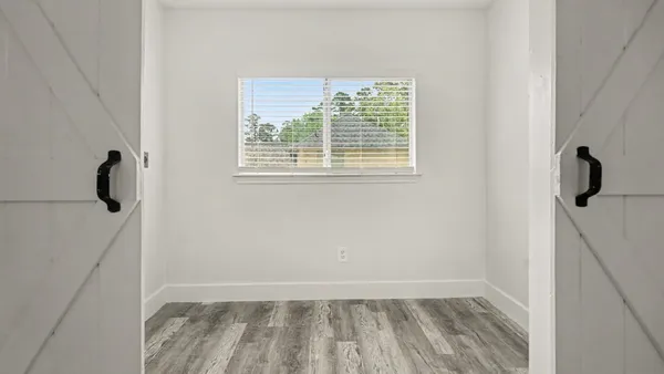 a view of small space with racks on the wall