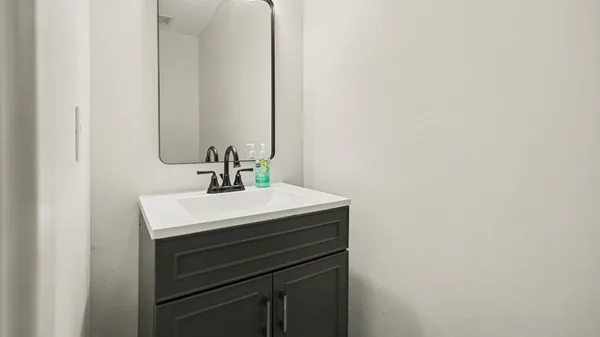 a sink with a mirror