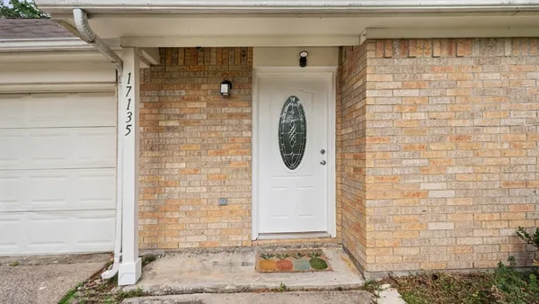 a front view of a house with a shower