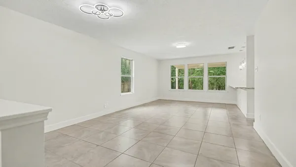 an empty room with windows