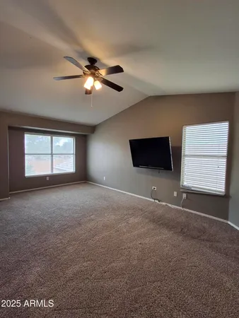a view of a livingroom with a flat screen tv