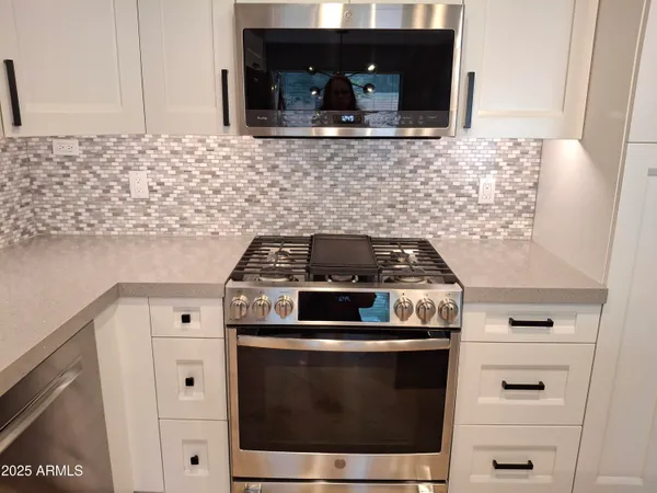 a close view of a stove in the kitchen