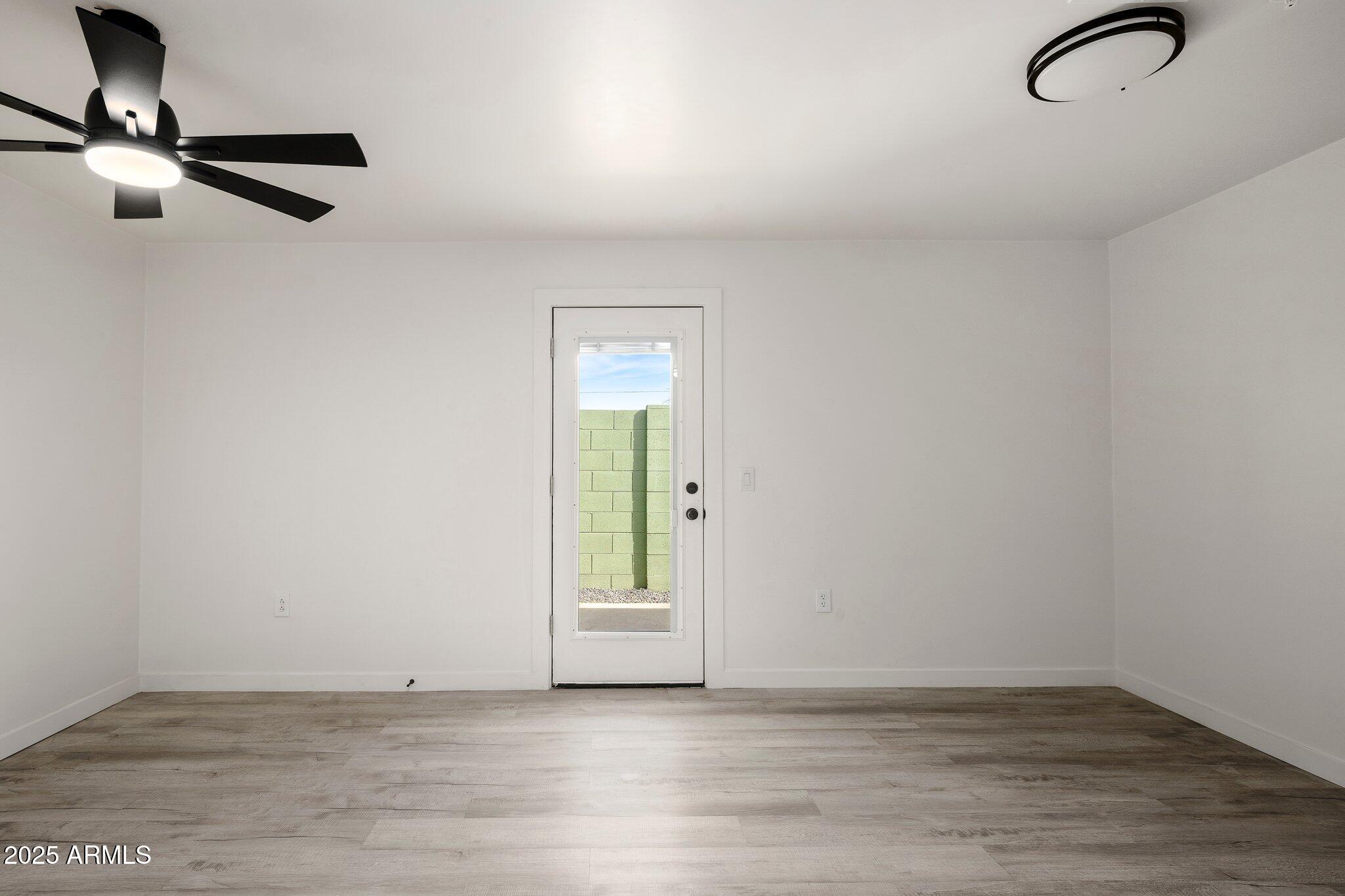 3114 North 68th Street, Unit 3 Scottsdale, AZ 85251 - Photo 20 of 25 a view of an empty room with a window