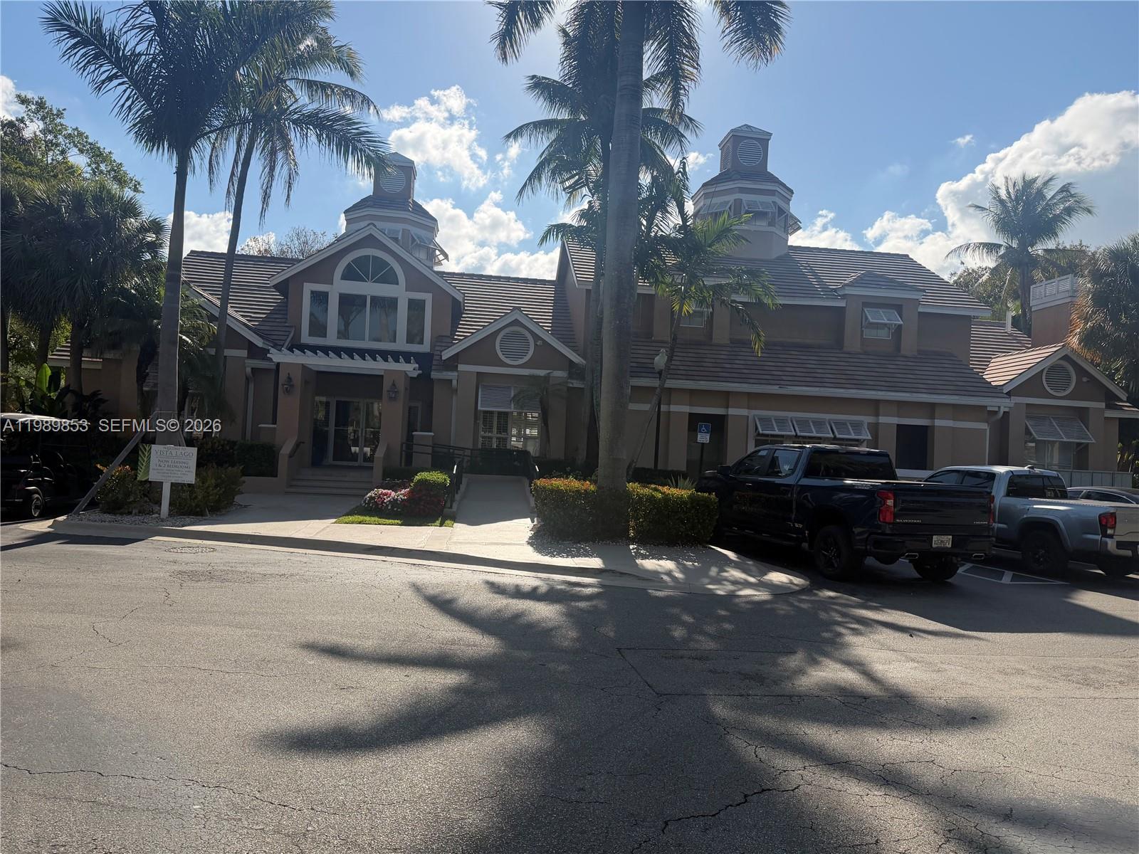 10670 Southwest 156th Place, Unit 308 Miami, FL 33196 - Photo 10 of 21 a view of a house with a yard