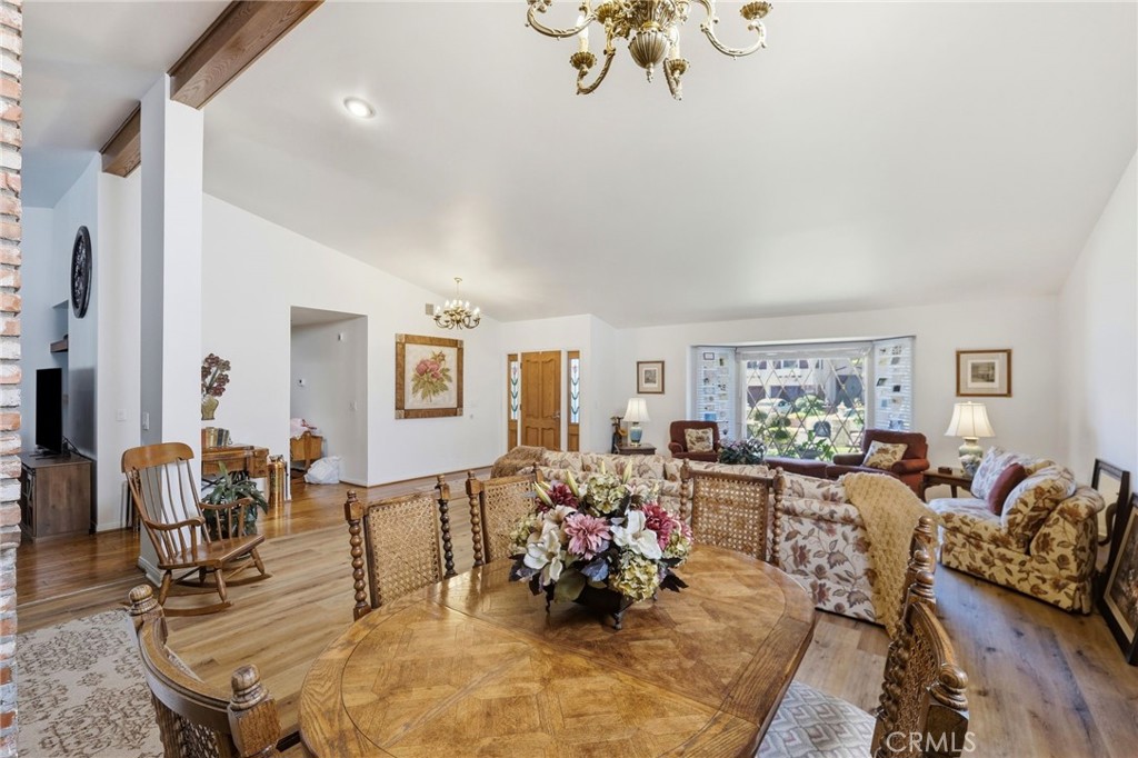 18233 Charlton Lane Porter Ranch, CA 91326 - Photo 40 of 40 a living room with furniture and wooden floor
