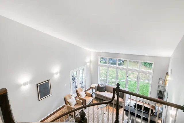 a view of a livingroom with furniture and window