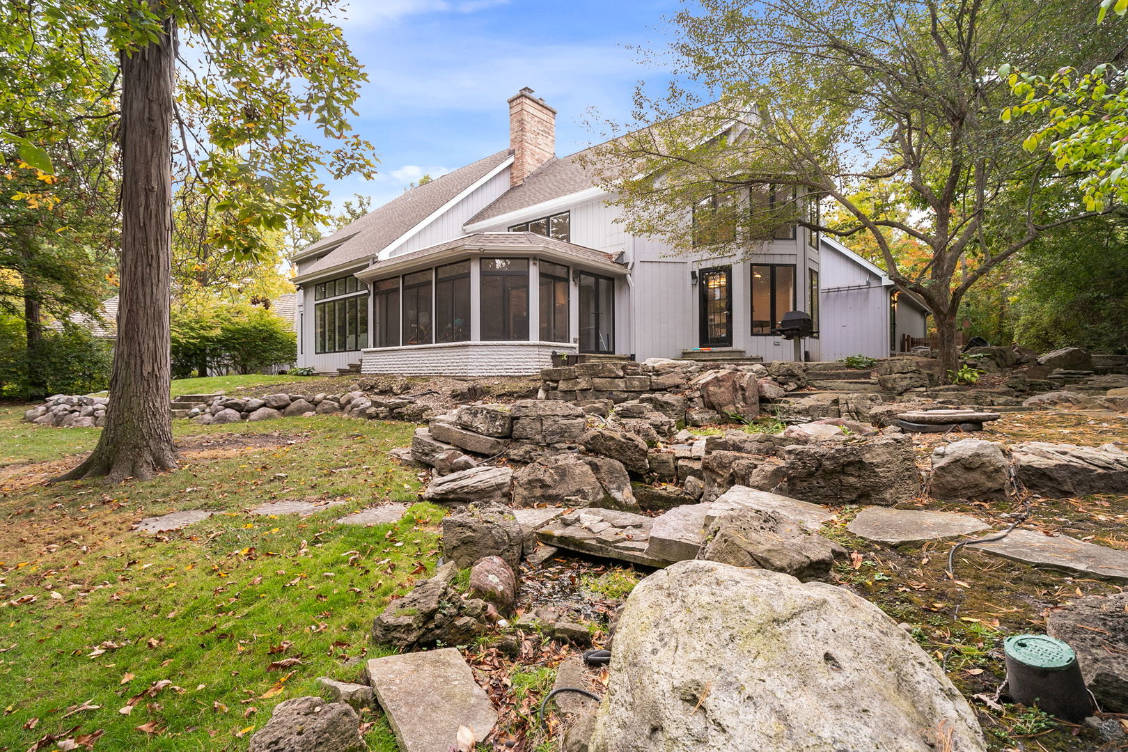 55 Trowbridge Circle Lake Bluff, IL 60044 - Photo 27 of 31 a front view of a house with a yard