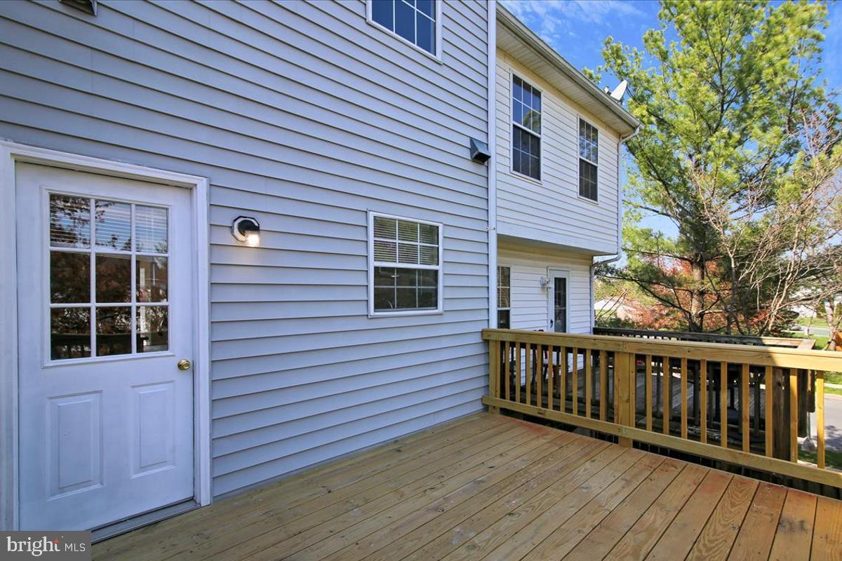 106 Princetown Drive, Unit 5B Frederick, MD 21702 - Photo 20 of 38 a view of a house with a deck