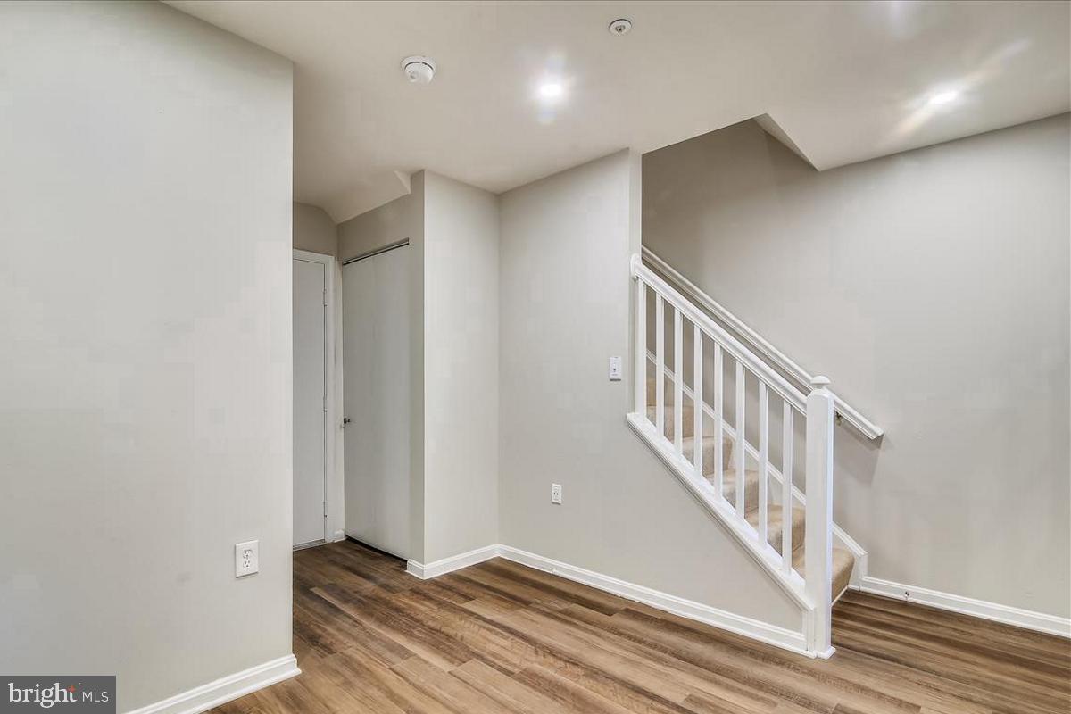 106 Princetown Drive, Unit 5B Frederick, MD 21702 - Photo 22 of 38 a view of an entryway with wooden floor