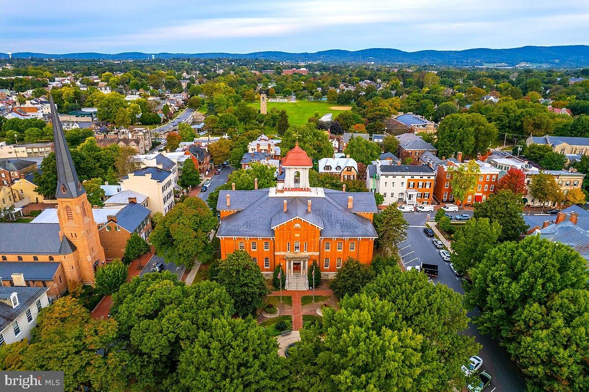 106 Princetown Drive, Unit 5B Frederick, MD 21702 - Photo 33 of 38 an aerial view of residential houses with outdoor space and outdoor space