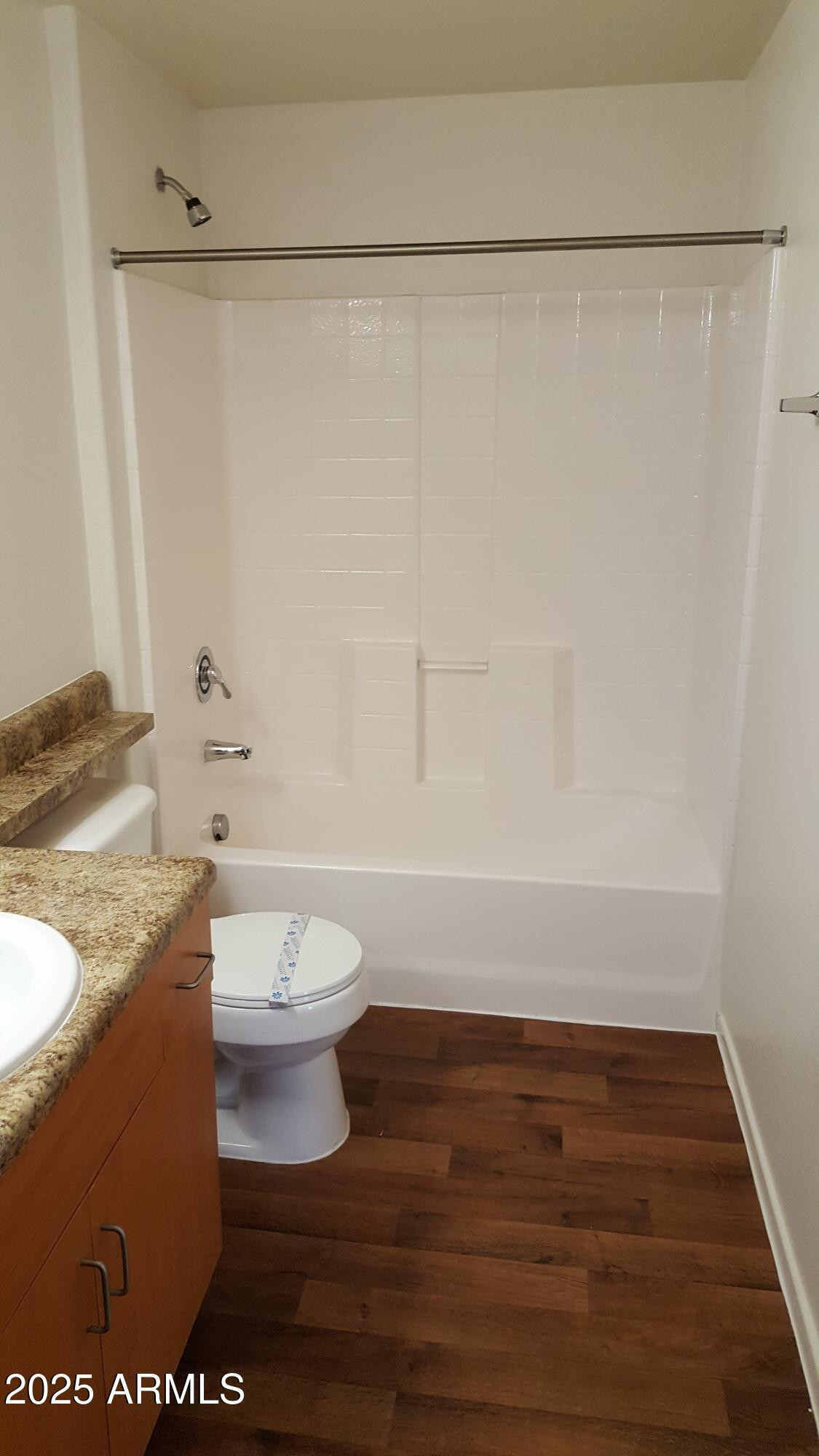 110 West Bell Road, Unit 1 Phoenix, AZ 85023 - Photo 7 of 19 a bathroom with a toilet a sink and shower