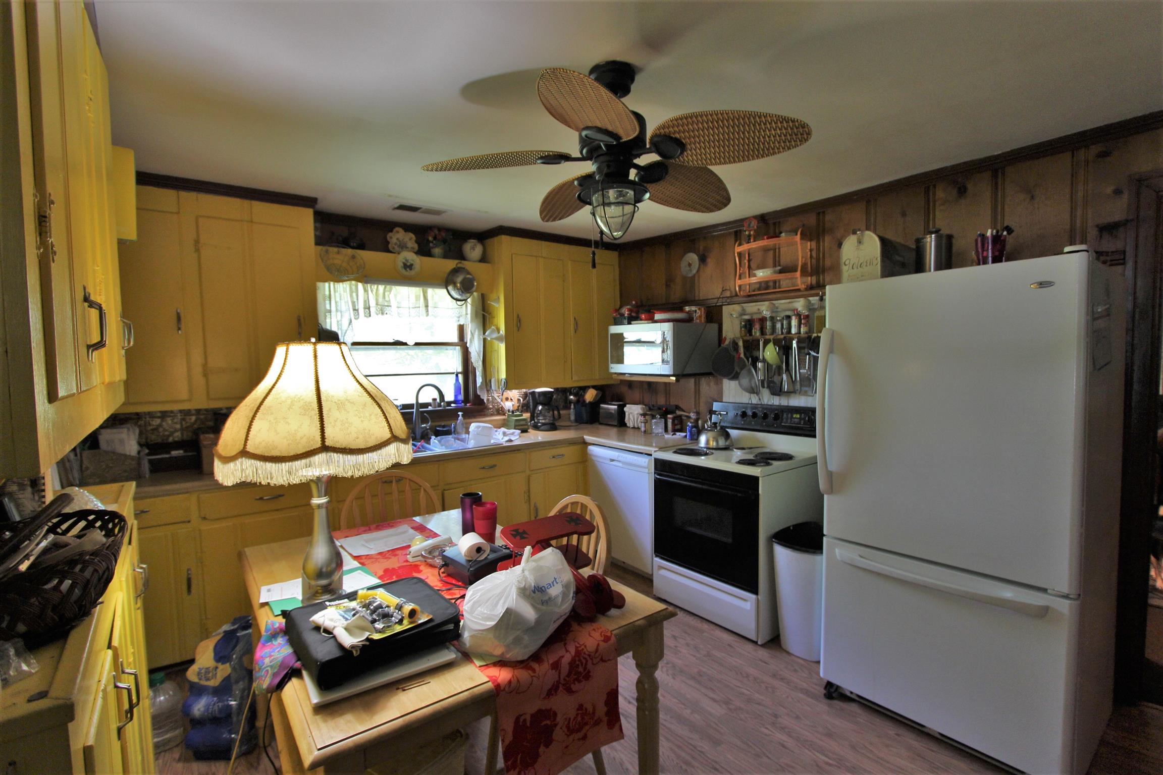 3530 Franklin Road Lebanon, TN 37090 - Photo 15 of 18 a kitchen with stainless steel appliances a stove a refrigerator cabinets and a chandelier