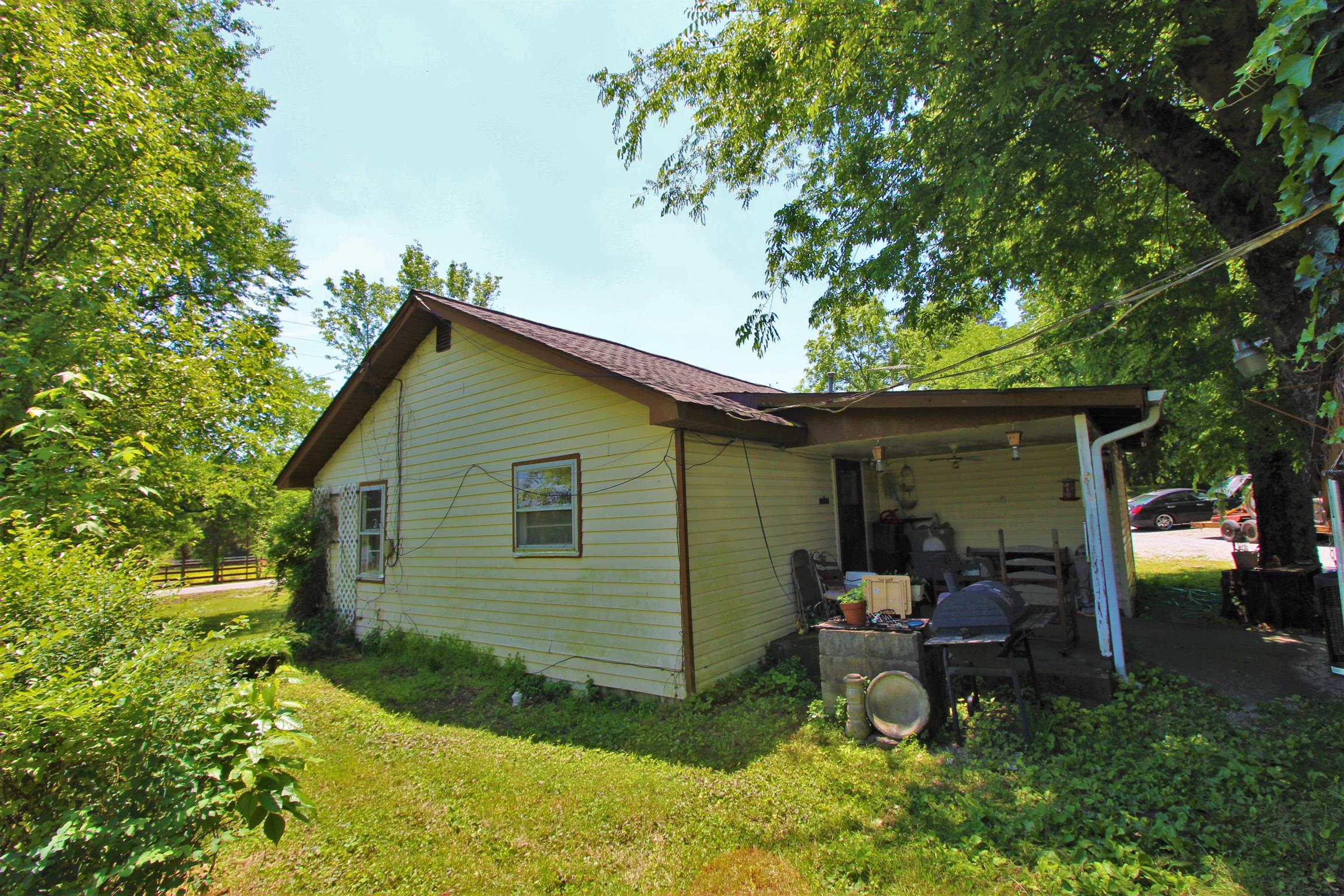 3530 Franklin Road Lebanon, TN 37090 - Photo 6 of 18 a backyard of a house with yard and outdoor seating