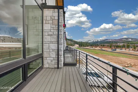 a view of balcony with hardwood floor