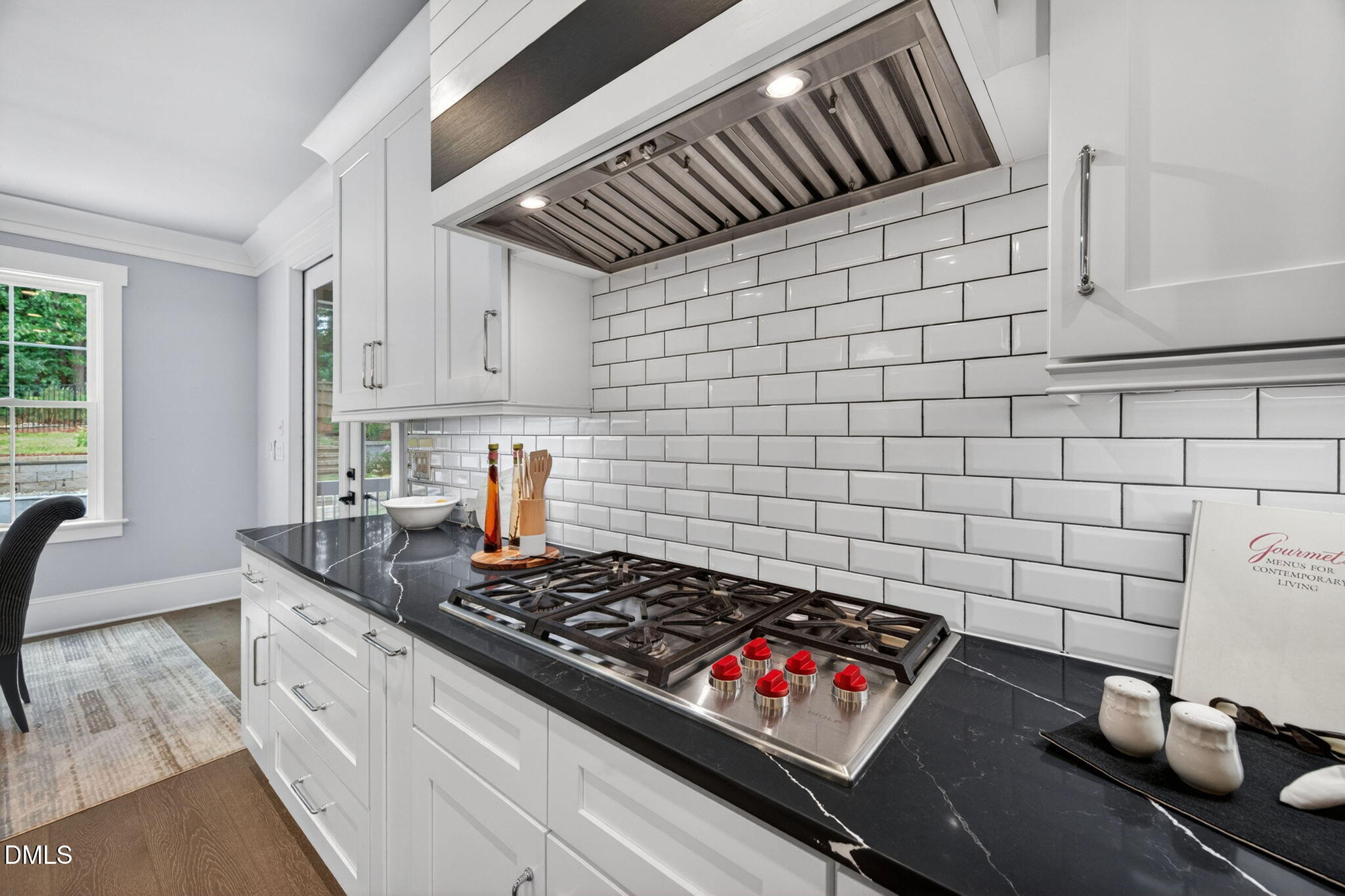 3417 Edgemont Drive Raleigh, NC 27612 - Photo 19 of 83 a kitchen with a stove and cabinets