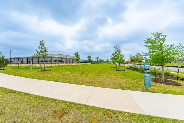 a view of swimming pool with seating area