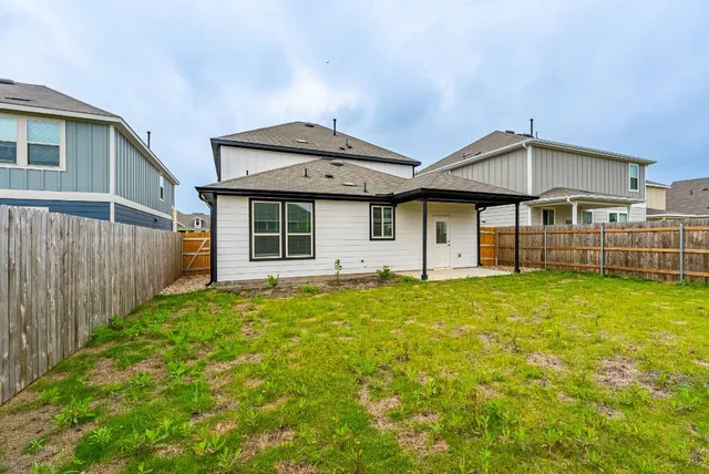 a view of a golf course with a lake view