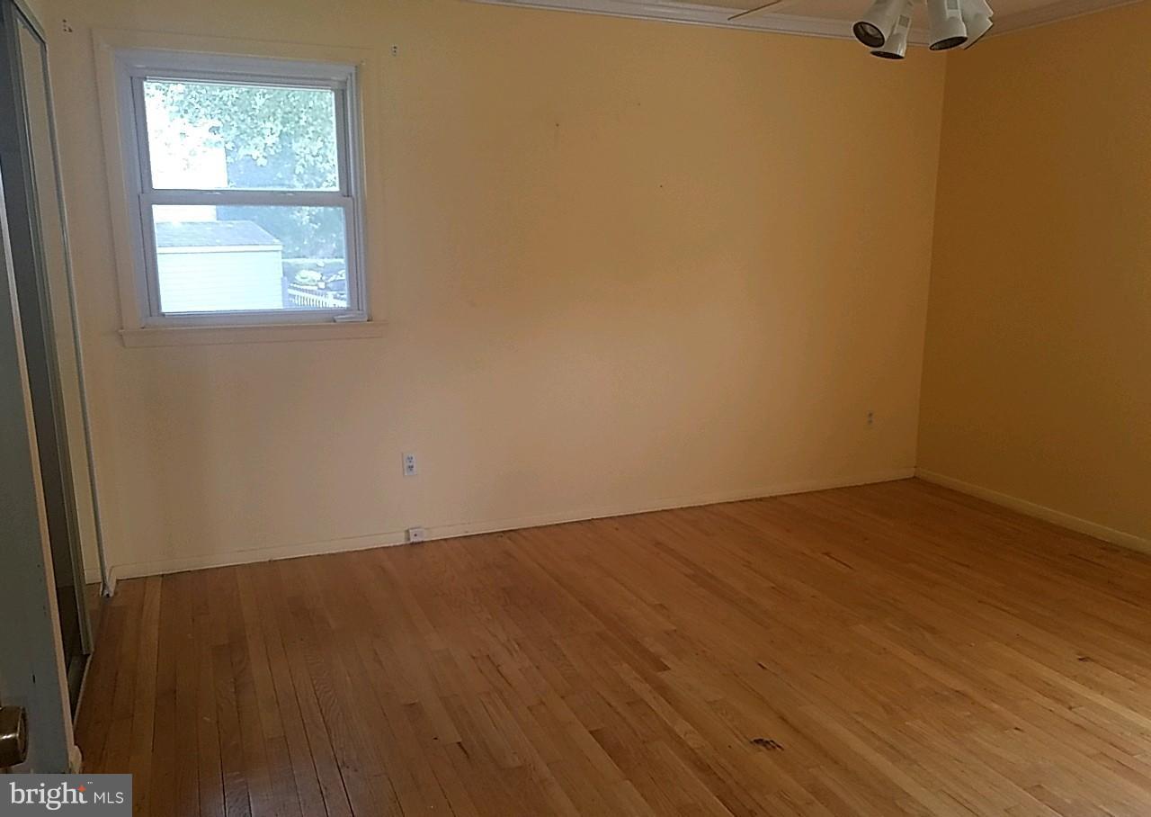 4618 Ballygar Road Baltimore, MD 21236 - Photo 18 of 29 an empty room with a window
