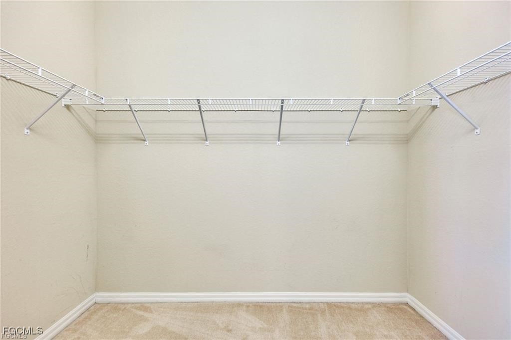 11758 Izarra Way, Unit 7703 Fort Myers, FL 33912 - Photo 15 of 37 a view of a small space