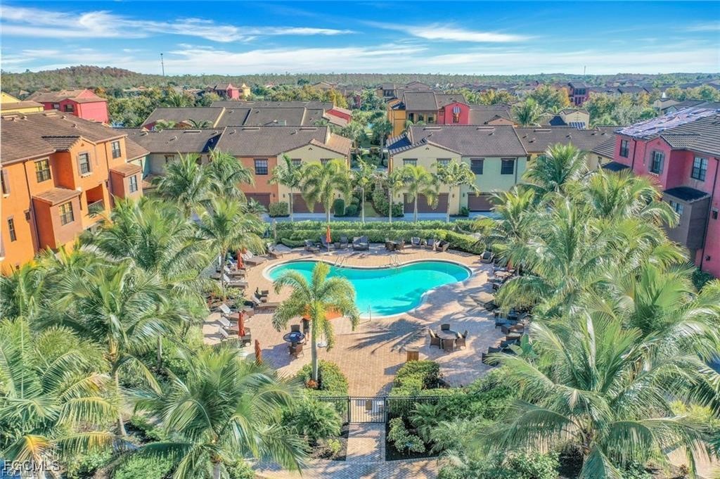 11758 Izarra Way, Unit 7703 Fort Myers, FL 33912 - Photo 22 of 37 an aerial view of a city