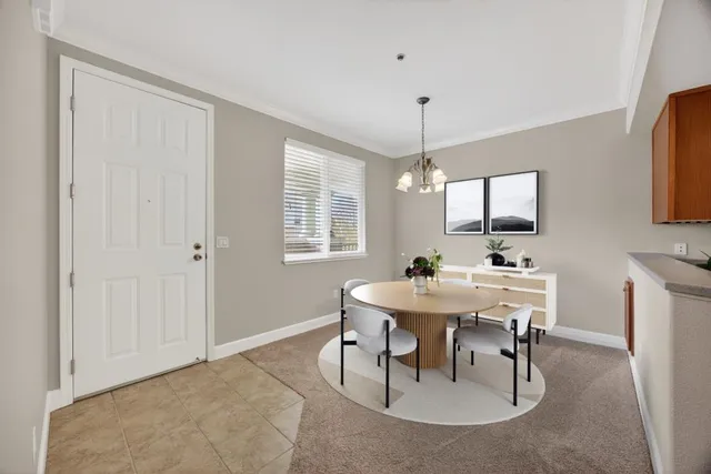 a view of a dining room with furniture