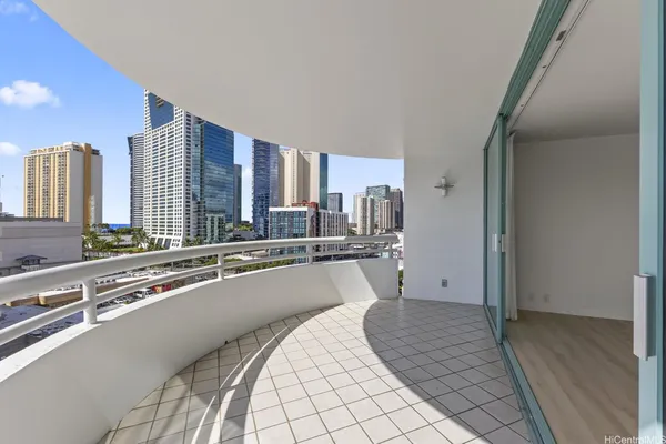 a room with a large bed and a large window