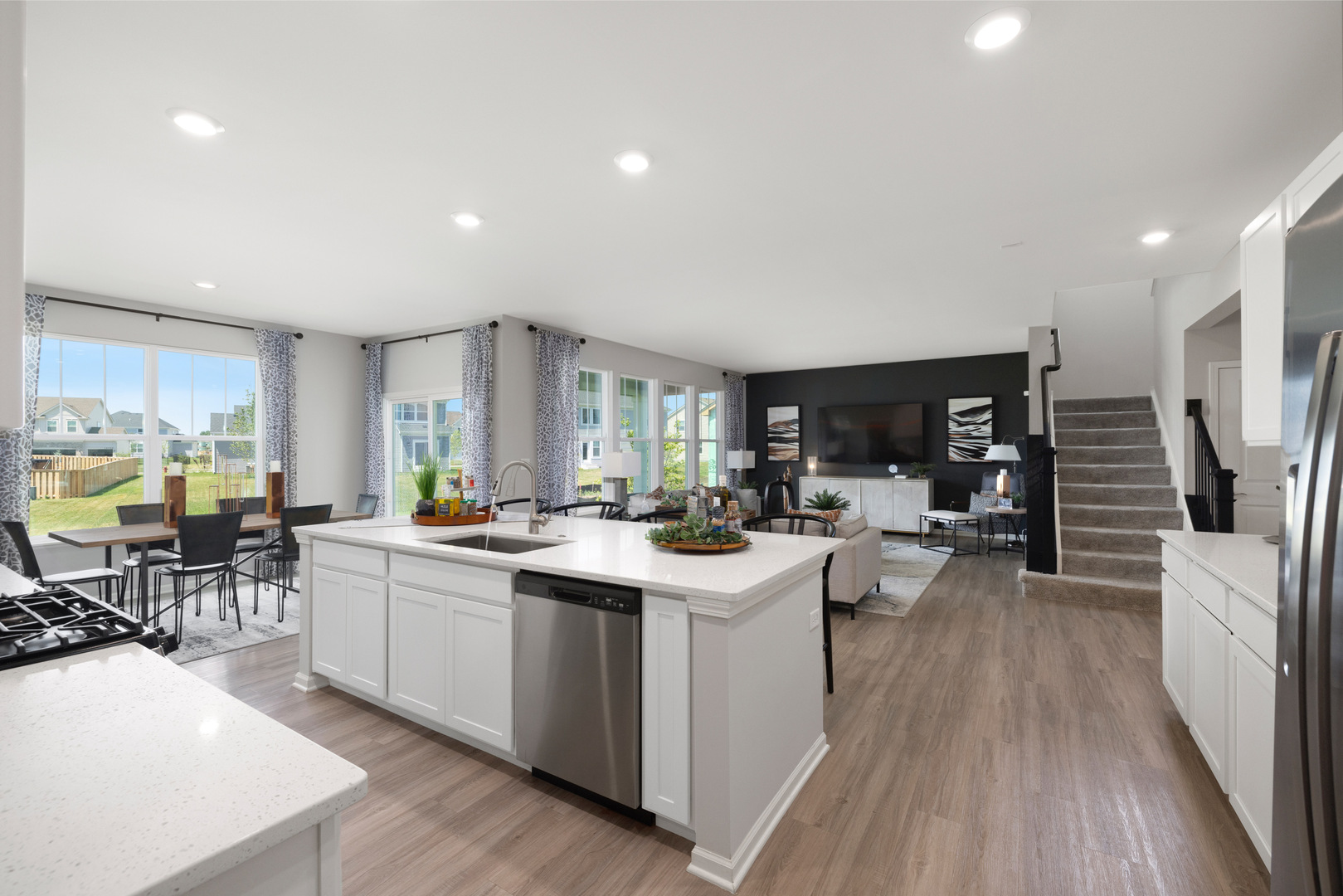1040 Waterford Street Algonquin, IL 60102 - Photo 7 of 18 a kitchen with lots of counter top space and wooden floor