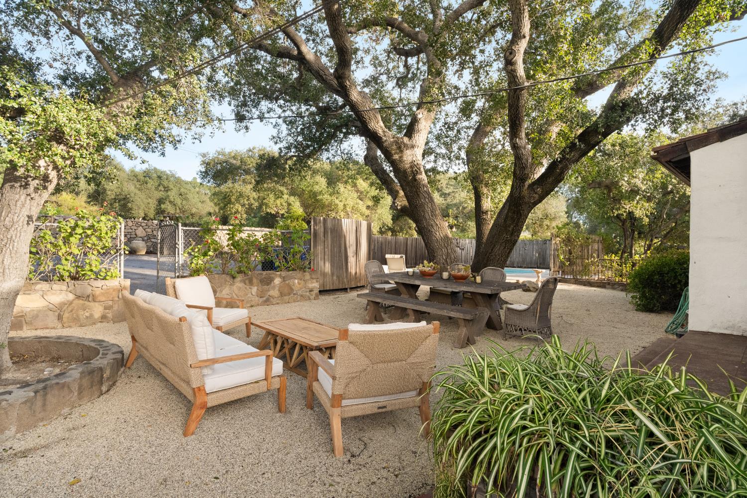 3935 Thacher Road Ojai, CA 93023 - Photo 21 of 50 a view of a patio with a table and chairs under an umbrella