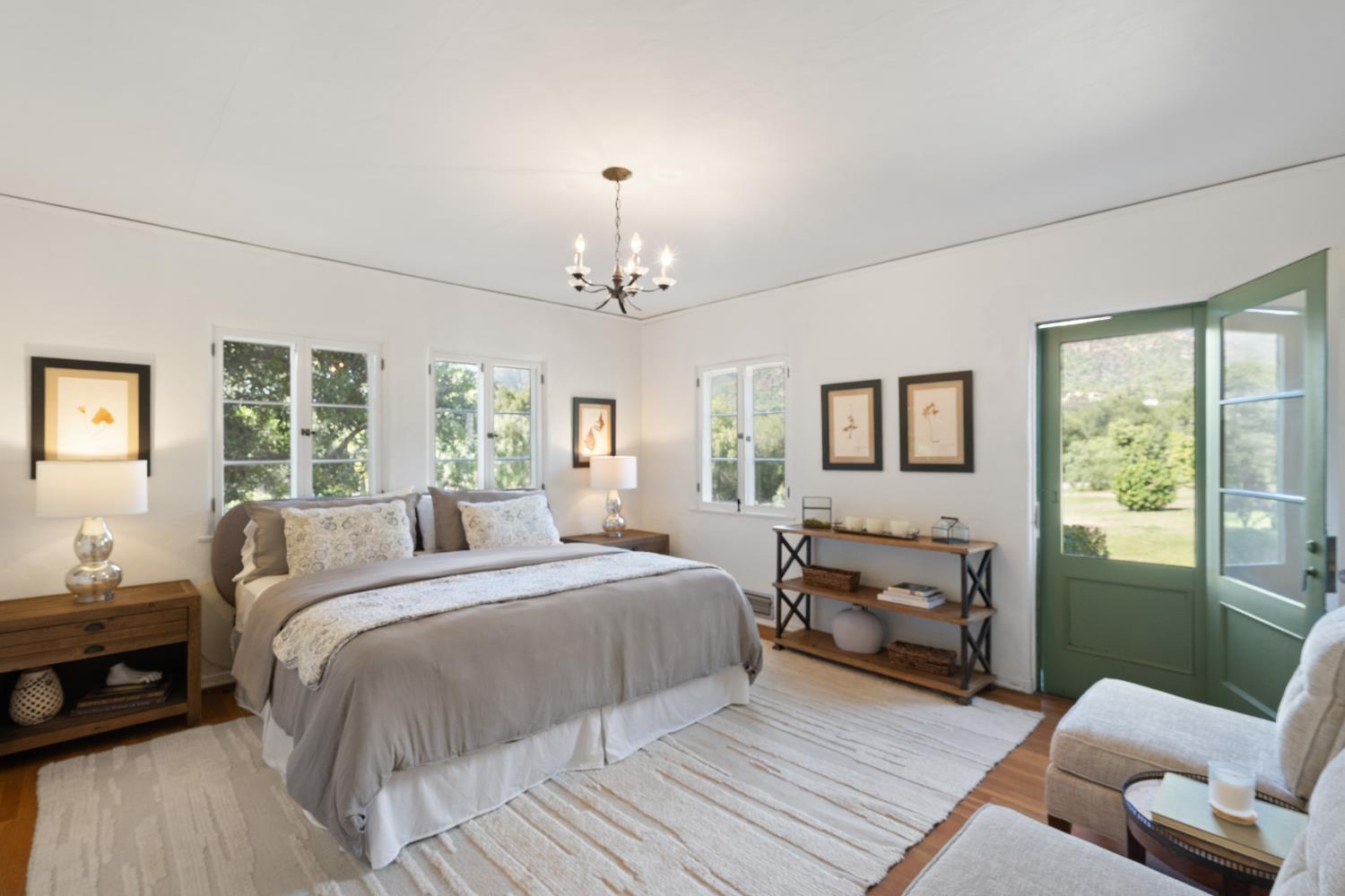 3935 Thacher Road Ojai, CA 93023 - Photo 23 of 50 a spacious bedroom with a bed and wooden floor