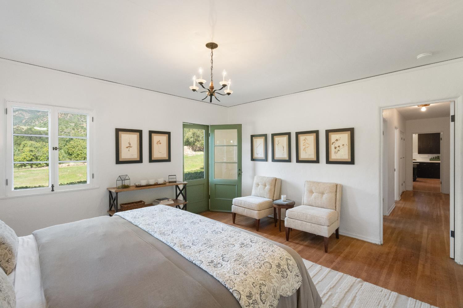 3935 Thacher Road Ojai, CA 93023 - Photo 24 of 50 a spacious bedroom with a bed and wooden floor
