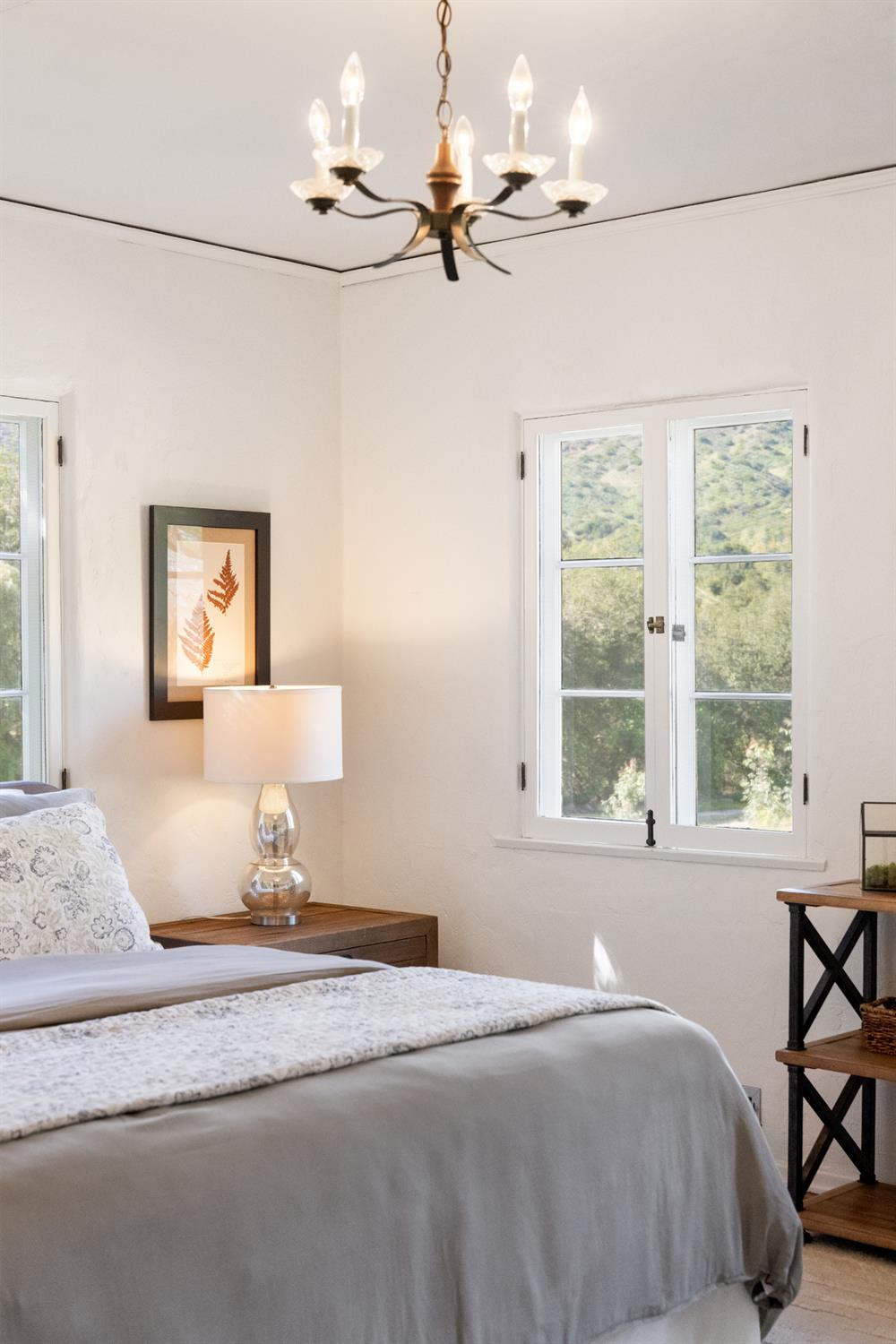 3935 Thacher Road Ojai, CA 93023 - Photo 25 of 50 a bedroom with a bed dresser and a window