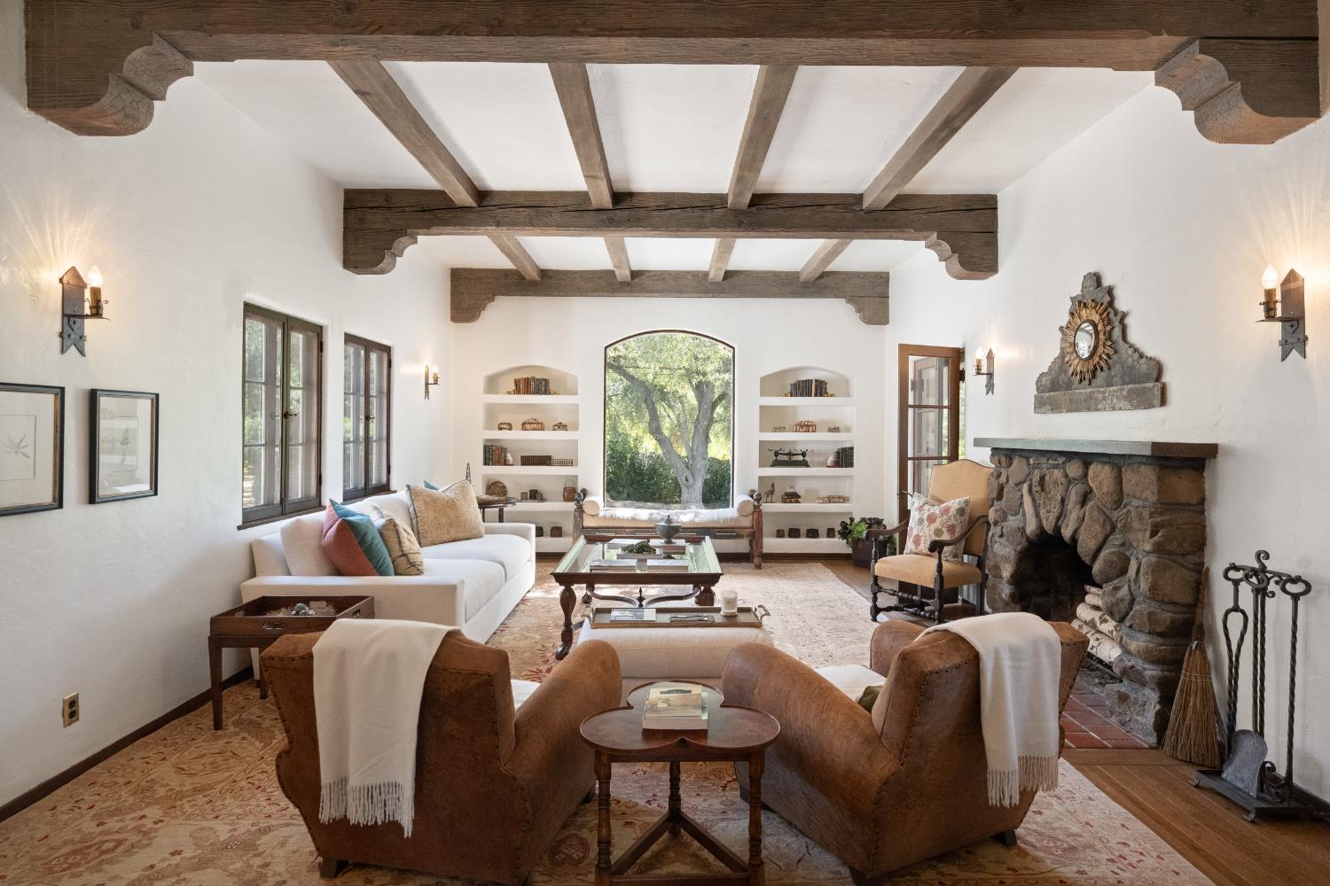 3935 Thacher Road Ojai, CA 93023 - Photo 3 of 50 a living room with furniture fireplace and large mirror