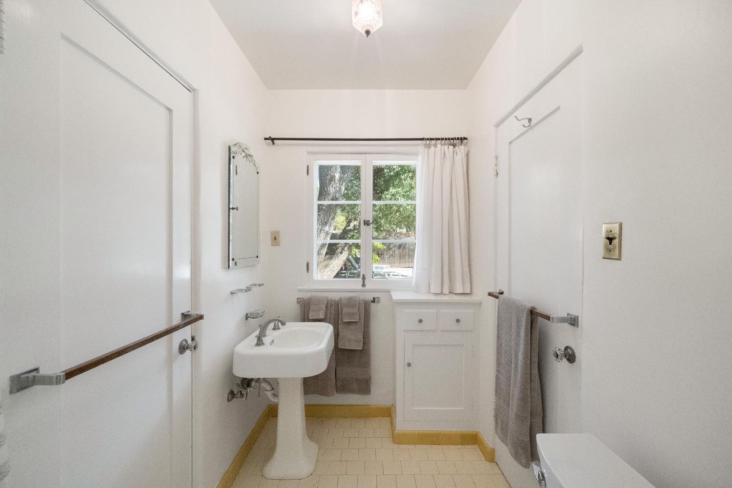 3935 Thacher Road Ojai, CA 93023 - Photo 34 of 50 a bathroom with a sink toilet and shower