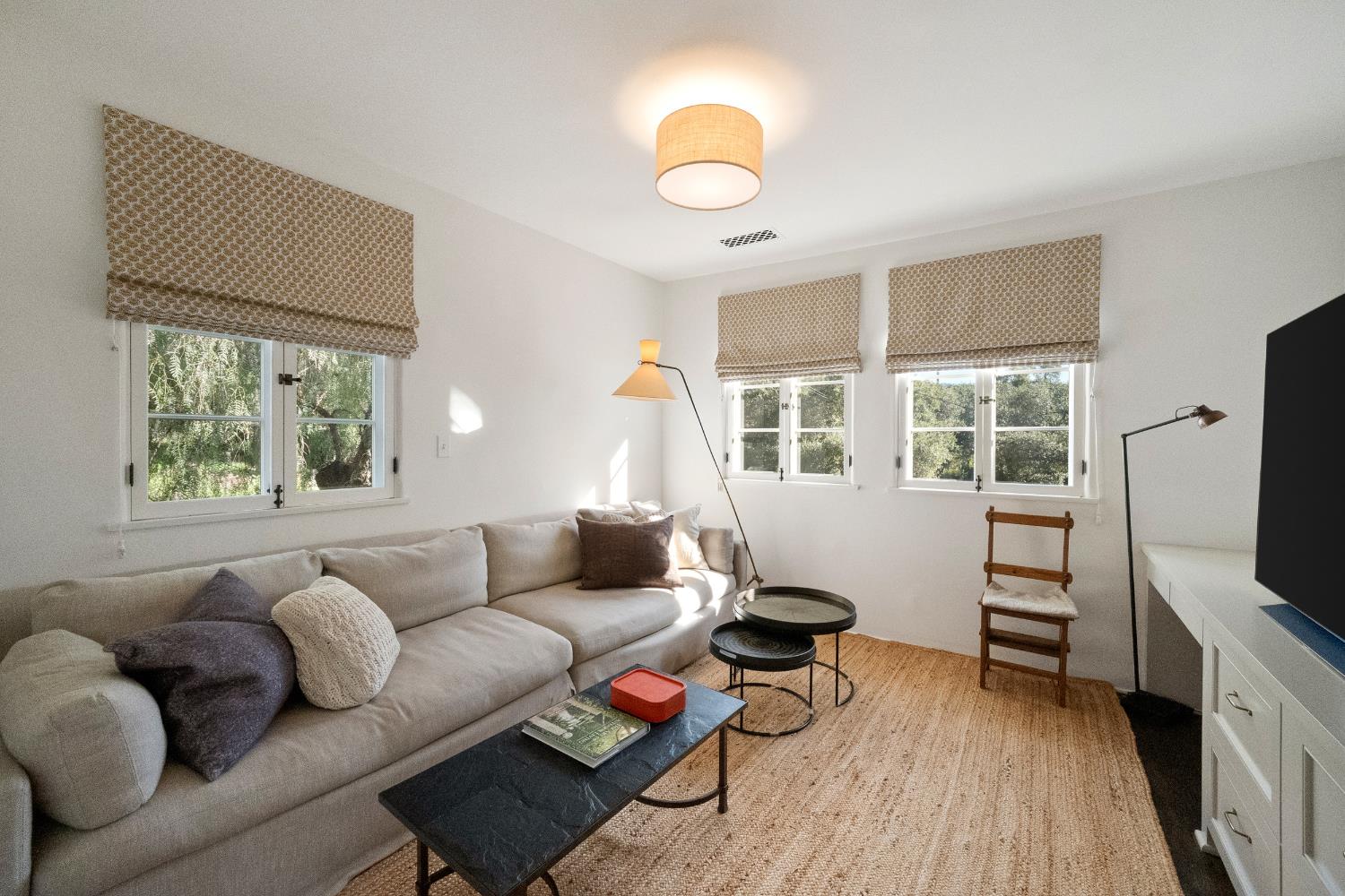 3935 Thacher Road Ojai, CA 93023 - Photo 41 of 50 a living room with furniture and a flat screen tv