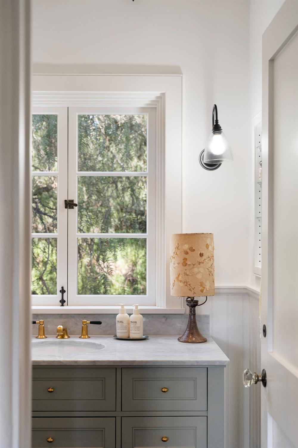 3935 Thacher Road Ojai, CA 93023 - Photo 45 of 50 a view of bathroom with a window sink and mirror