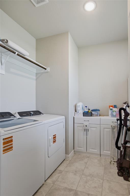 6343 Rustic Edge Street Godley, TX 76044 - Photo 26 of 37 Large laundry room with lots of space for extra storage