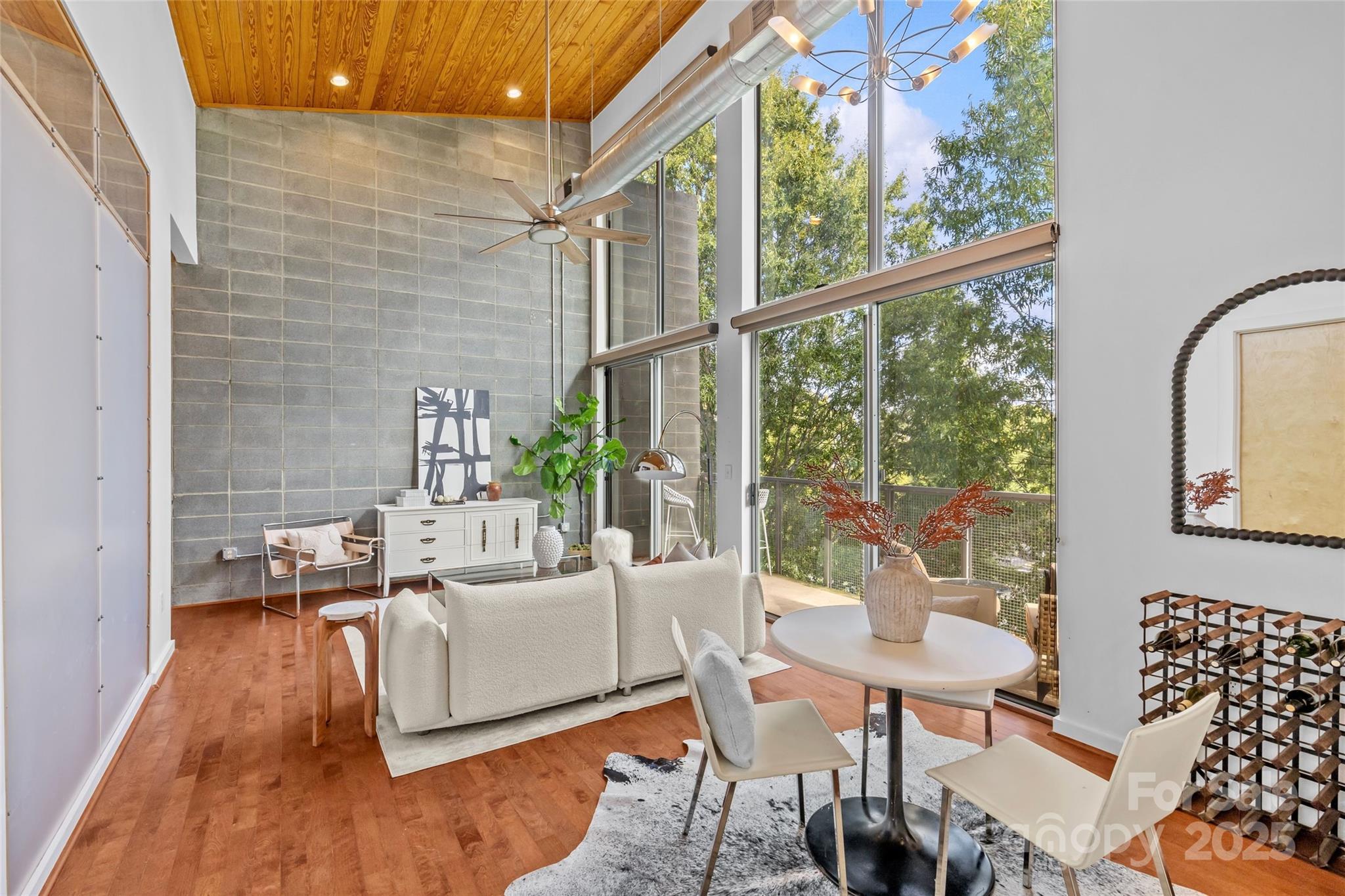 2116 McClintock Road, Unit 232 Charlotte, NC 28205 - Photo 17 of 48 a living room with furniture and a window