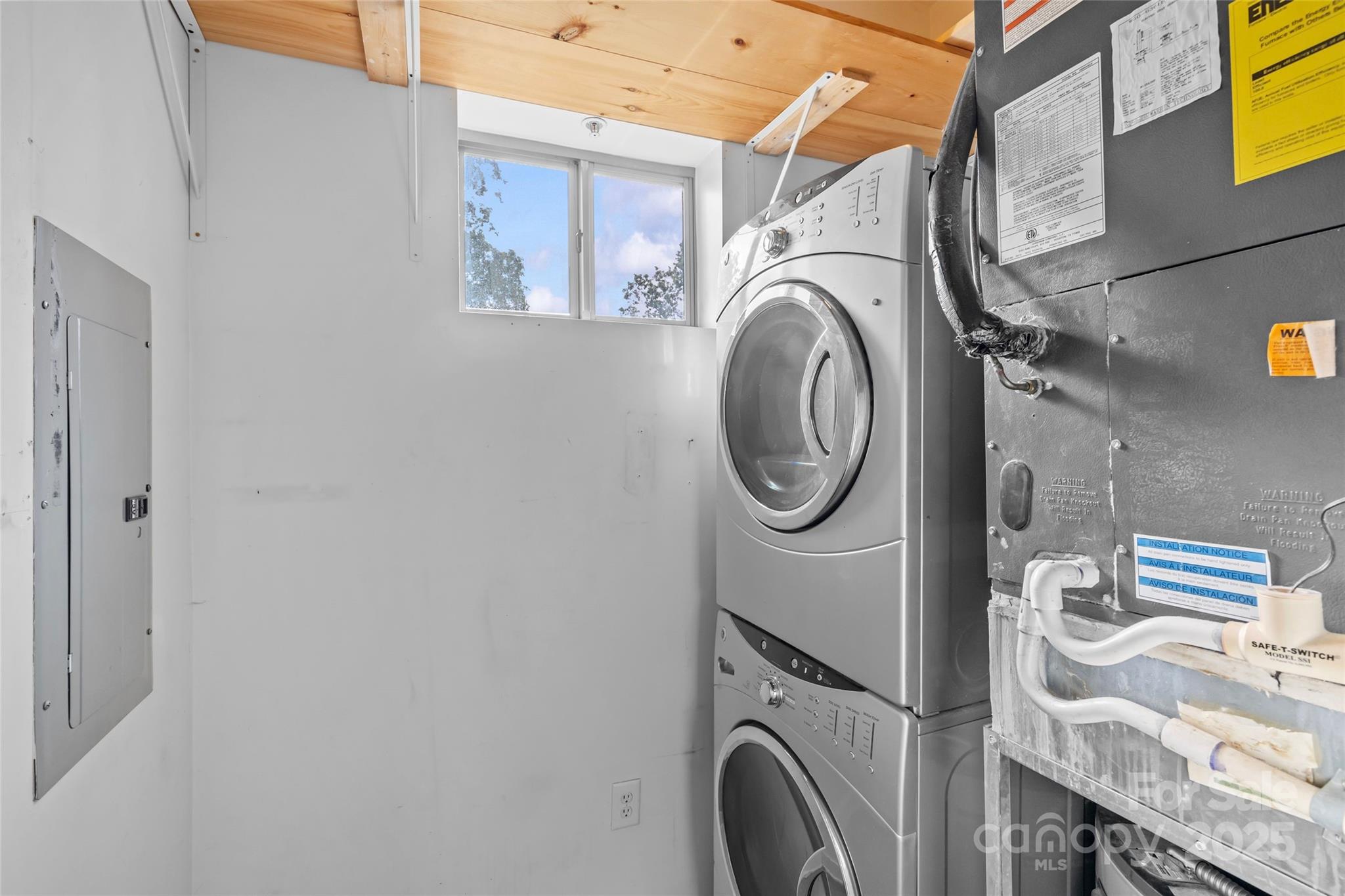 2116 McClintock Road, Unit 232 Charlotte, NC 28205 - Photo 28 of 48 a utility room with dryer and washer