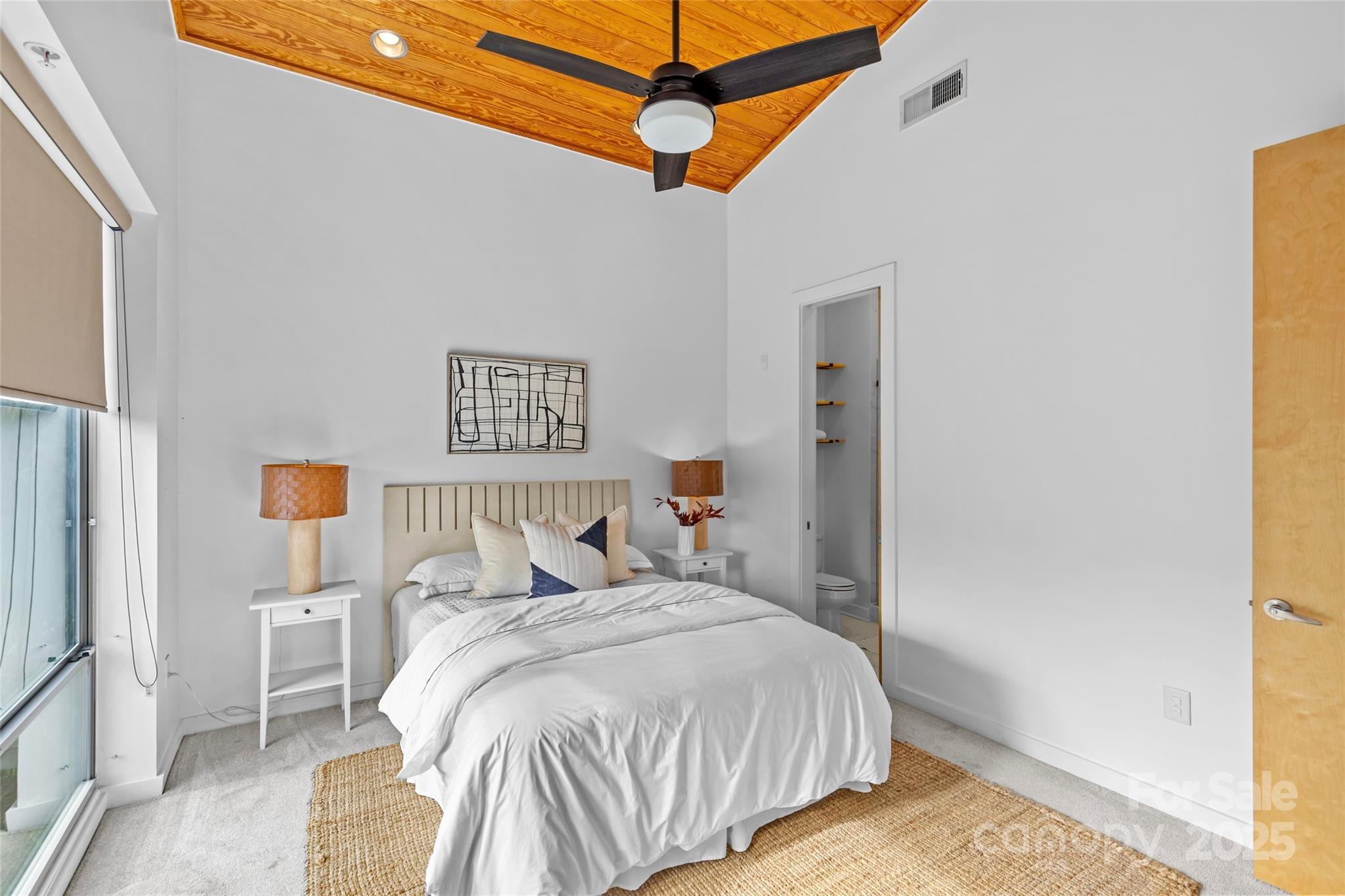 2116 McClintock Road, Unit 232 Charlotte, NC 28205 - Photo 31 of 48 a bedroom with a bed and a dresser