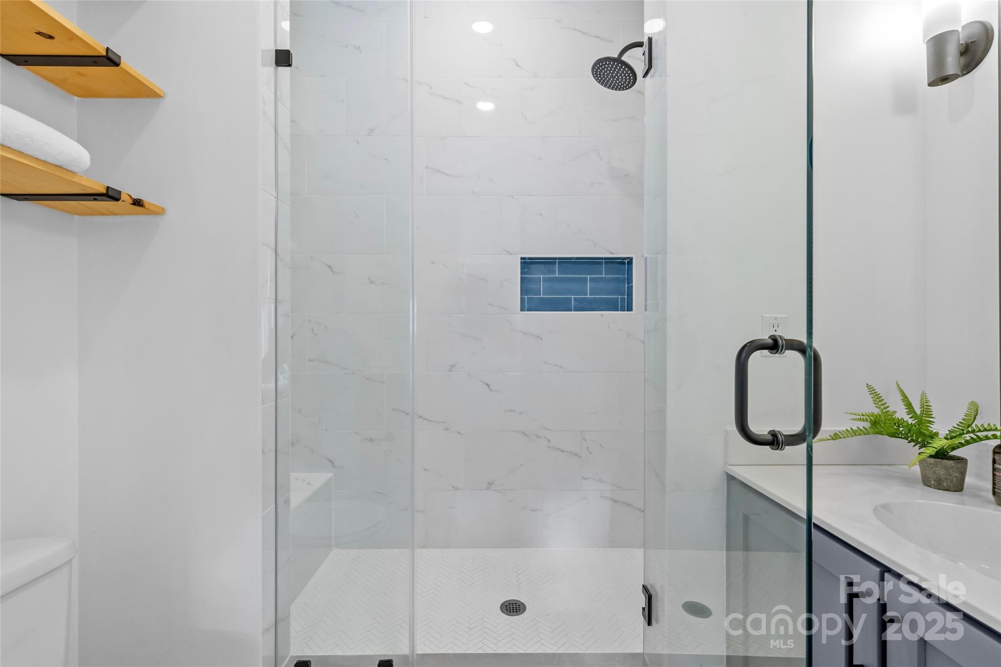 2116 McClintock Road, Unit 232 Charlotte, NC 28205 - Photo 36 of 48 a bathroom with a shower