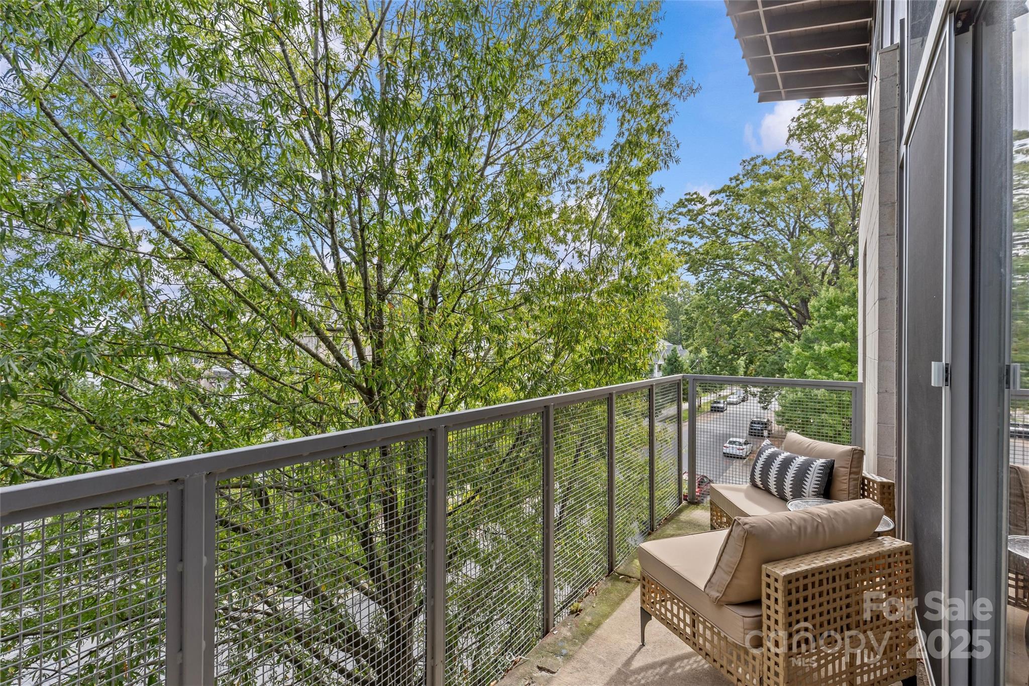 2116 McClintock Road, Unit 232 Charlotte, NC 28205 - Photo 38 of 48 a view of a balcony with furniture